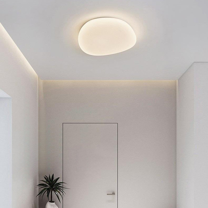 17-d6b07751-0846-404d-bff2-4e10d01d3cb6.jpg Modern Minimalist Pebble Shape Acrylic Hardware LED Flush Mount Ceiling Light For Bedroom - Image 1