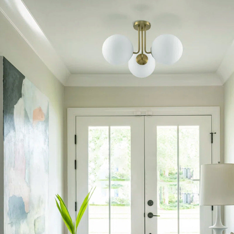 BS-Lighting-AW02191-3.jpg Contemporary Scandinavian Brass Glass Globe 3-Light Semi-Flush Mount Ceiling Light For Bedroom & Living Room - Image 1