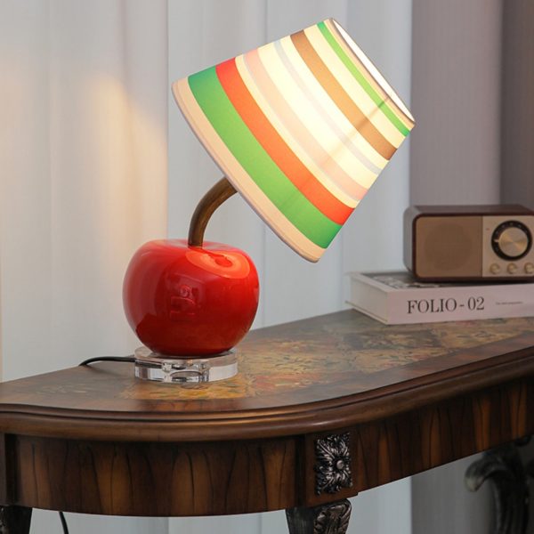 Contemporary Creative Resin & Fabric Tilted Apple 1-Light Table Lamp For Bedroom - Image 12