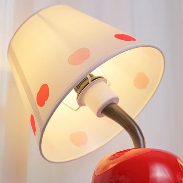 Contemporary Creative Resin & Fabric Tilted Apple 1-Light Table Lamp For Bedroom - Image 7