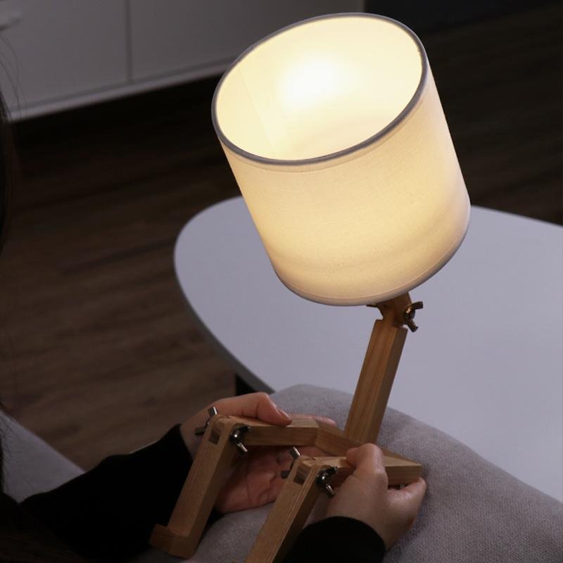 Z-1-5-91a82602-4cb6-444a-9c21-ac4247492a87-465443.jpg Adjustable LED Wooden Sitting Robot Table Lamp - Image 1