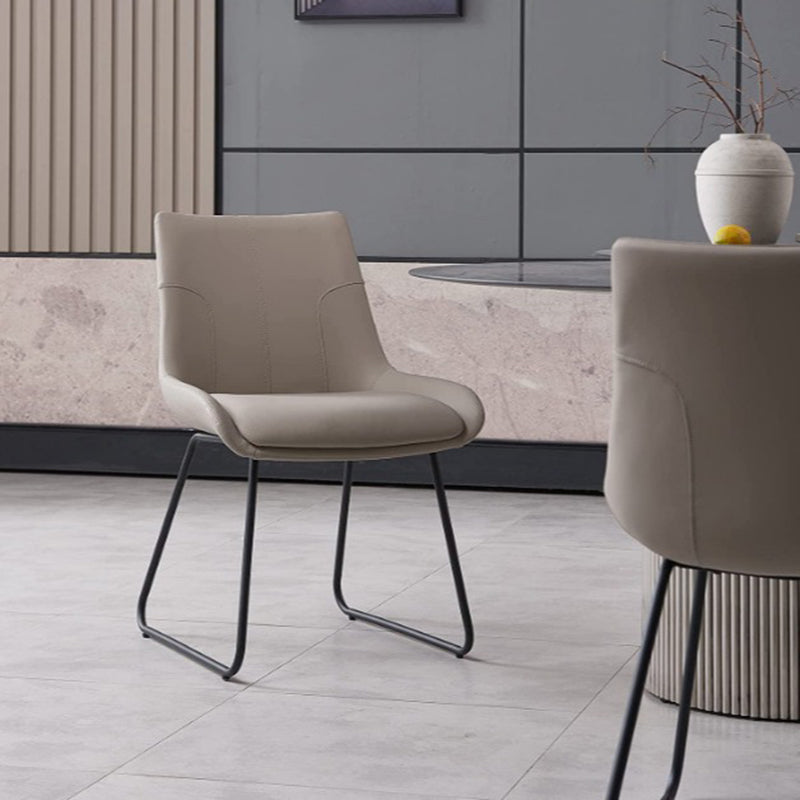 01-5295c40c-5e03-41eb-9556-2a6c511e5e41.jpg Contemporary Nordic Rectangular Upholstered Trapezoidal Base Leather Metal Dining Chair Backrest For Dining Room - Image 1