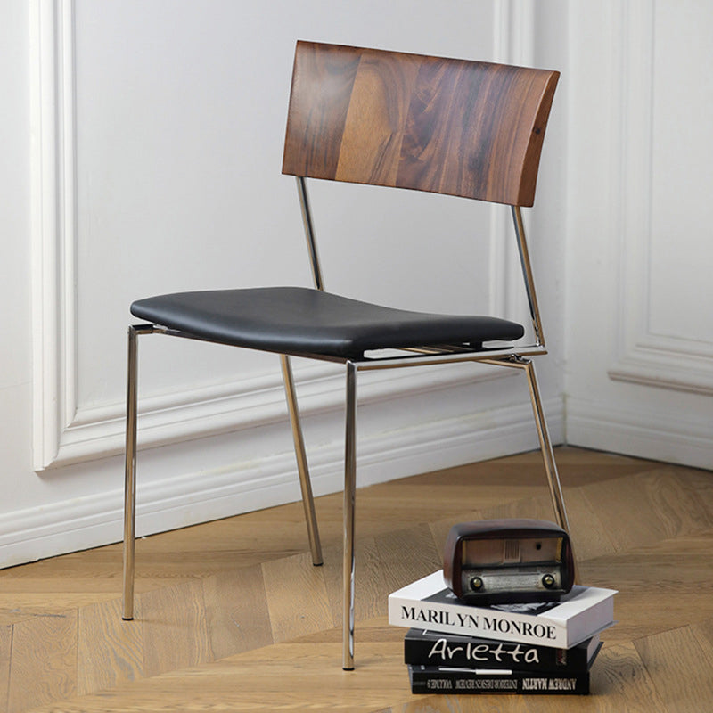 02-23654070-6526-4c34-9588-26eb6b15ec9f.jpg Contemporary Nordic Rectangular Curved Backrest Wood Leather Dining Chair For Dining Room - Image 1