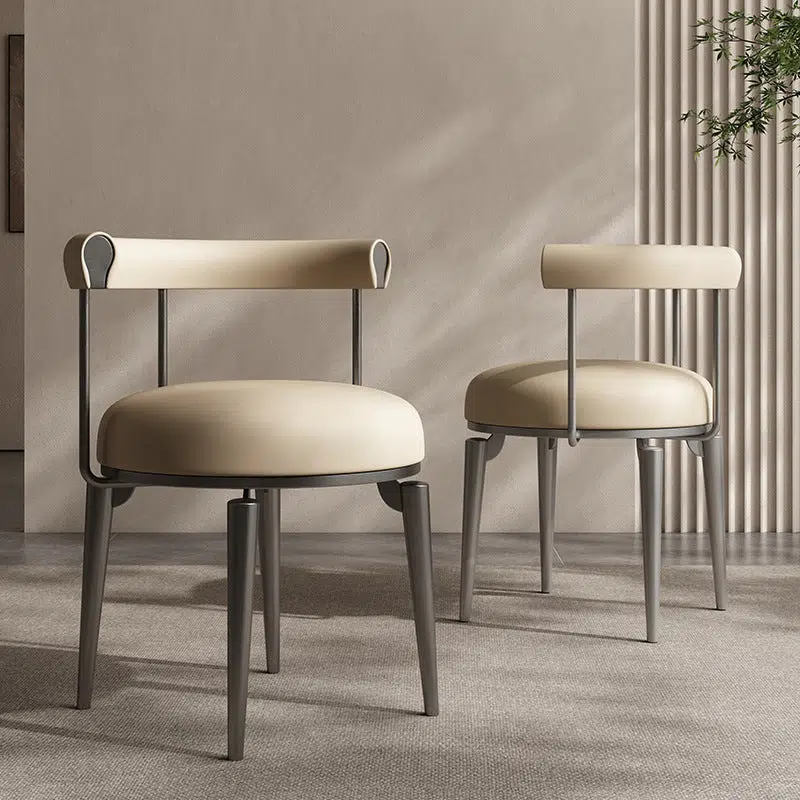 03-3022b578-bb55-4fa4-9699-50532ba01dd1.jpg Contemporary Nordic Round Upholstered Leather Stainless Steel Dining Chair Curved Backrest For Dining Room - Image 1