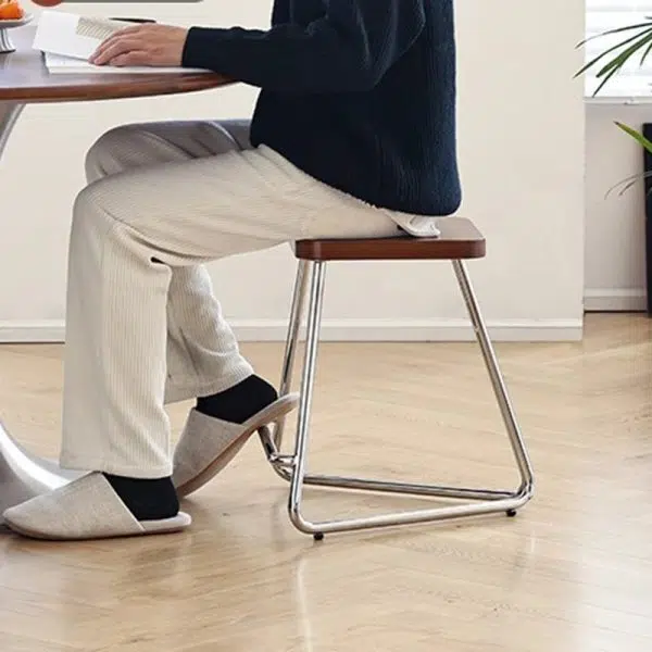 Contemporary Nordic Wood & Stainless Steel Rectangular Seat Low Stool With Triangular Base For Bedroom, Living Room, Dining Room - Image 8